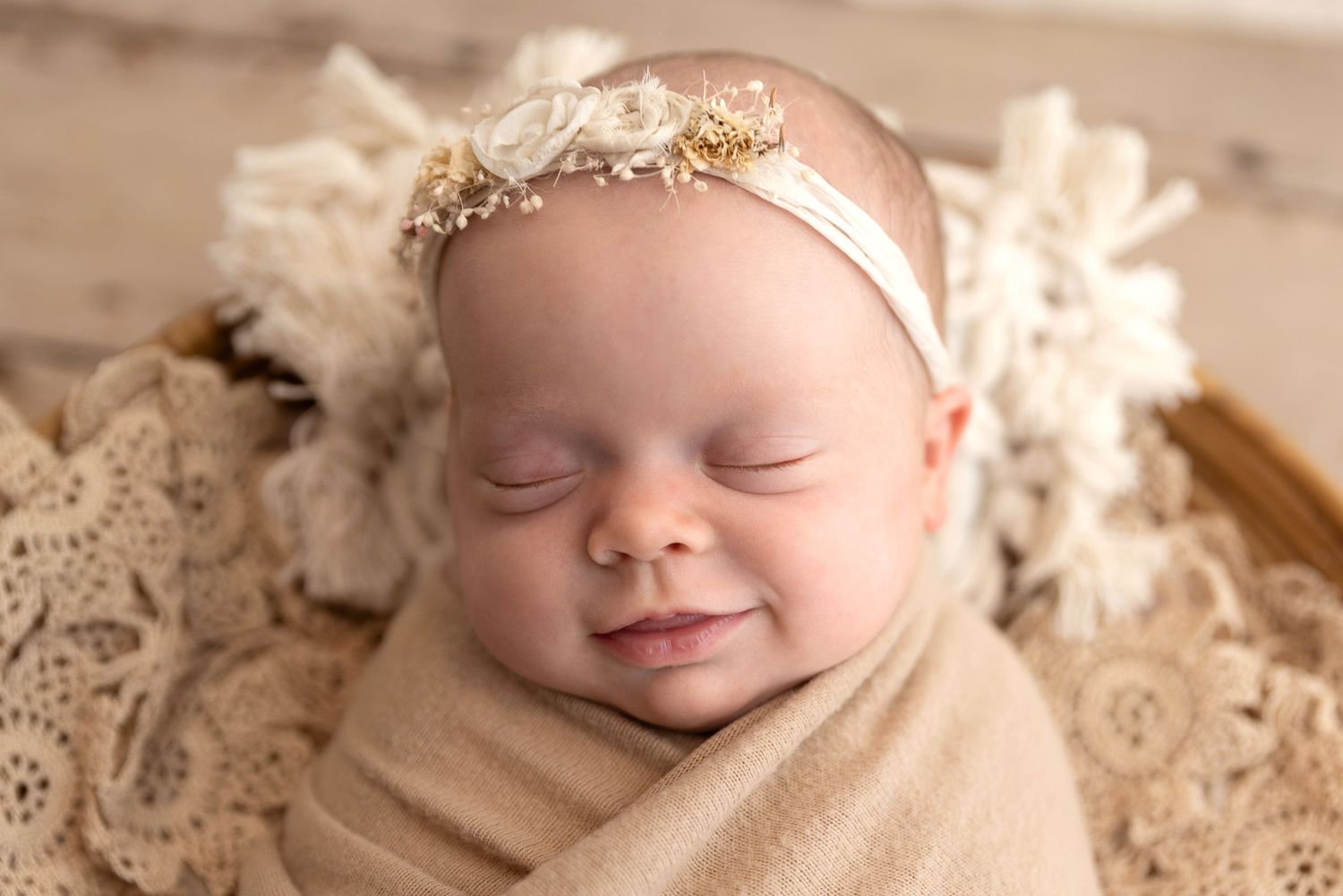 newborn girl smile