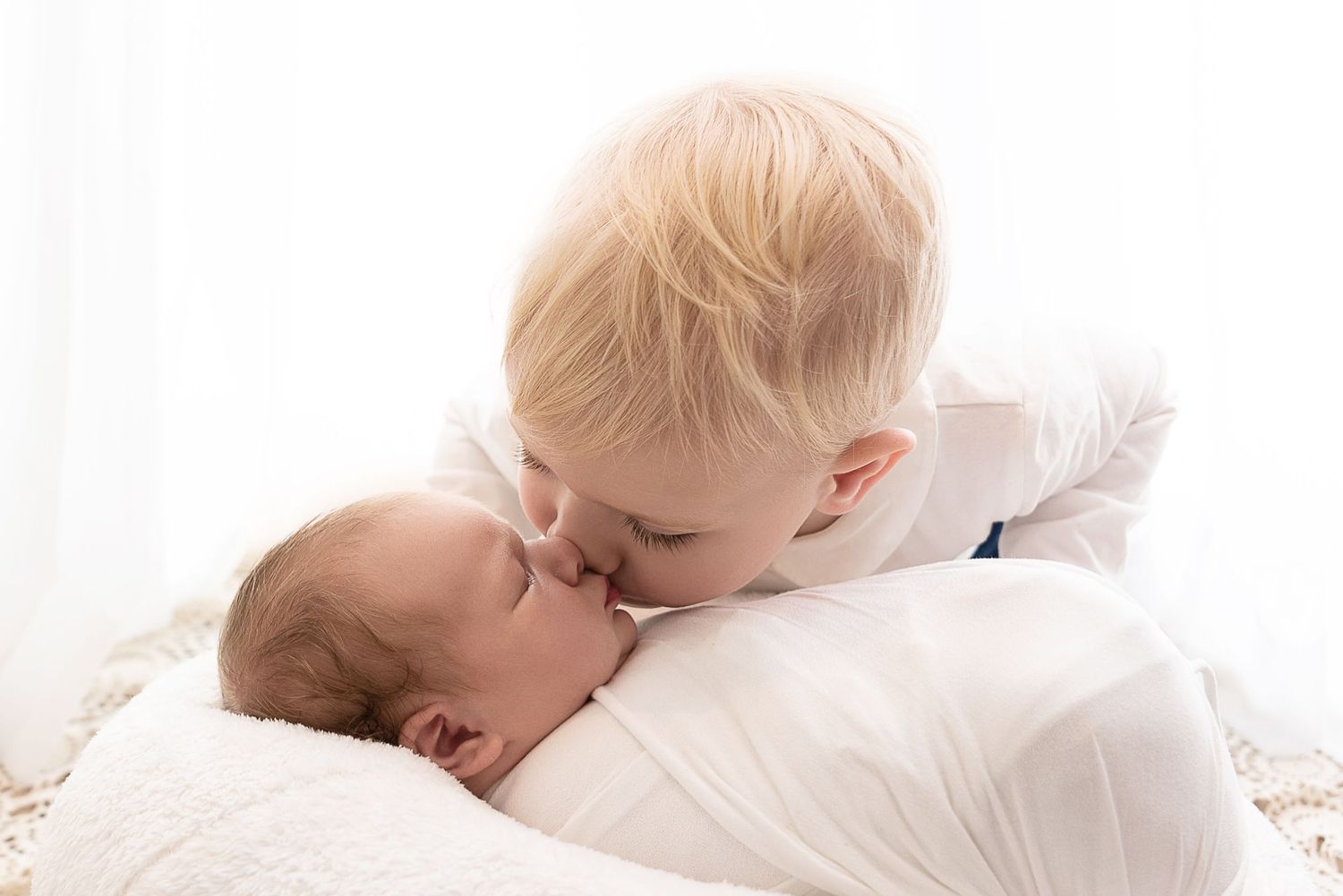 newborn siblings