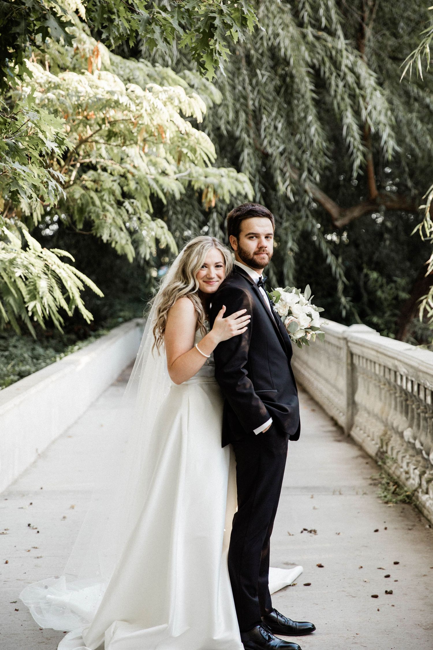 Bride and Groom embrace after getting married in Oakdale, California