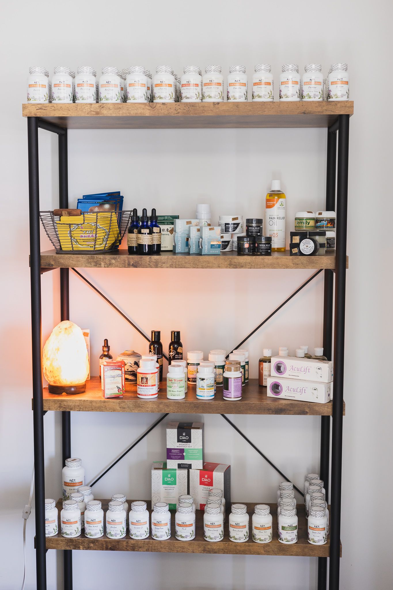 Maple Valley Acupuncture branding photo of supplement shelf of natural remedies for therapist to recommend to clients