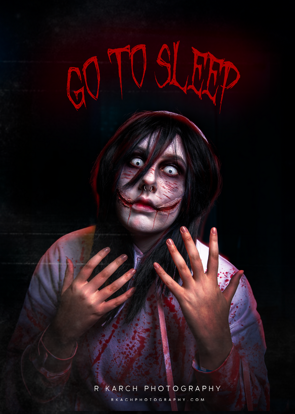 Horror-themed portrait with red neon 'Go To Sleep' sign and creepy makeup in dark setting.