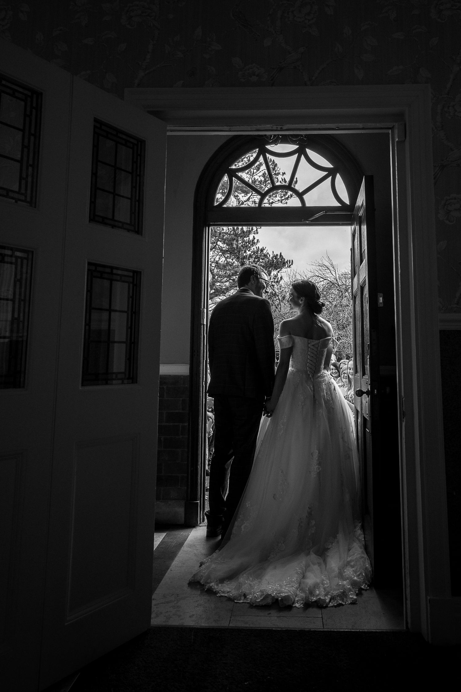 Walking out of the door at Kelham House to confetti