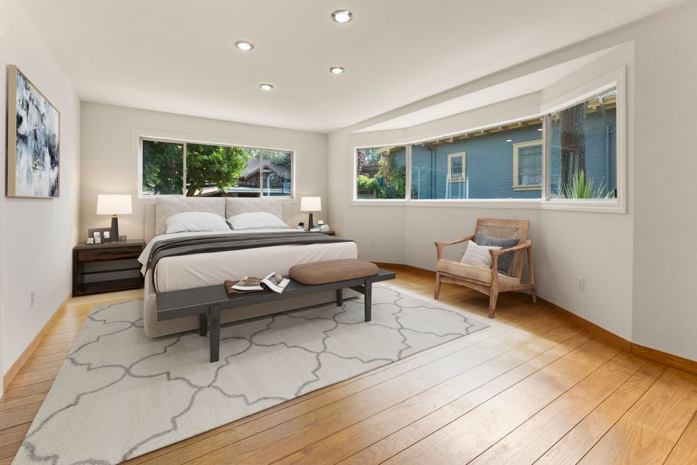 Bright open concept living space with hardwood floors and modern finishes.