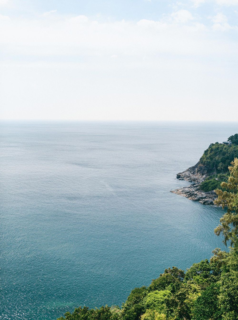 A breathtaking view of the ocean from a hillside in Phuket, Thailand.