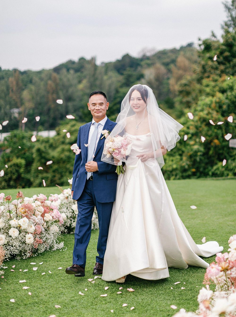 Bride's entrance at Phuket wedding ceremony captured by Stepan Vrzala Photography.