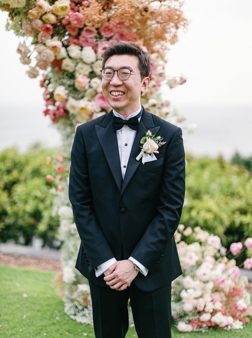 Fine art wedding photographer capturing the groom during a wedding ceremony in Phuket, Thailand.