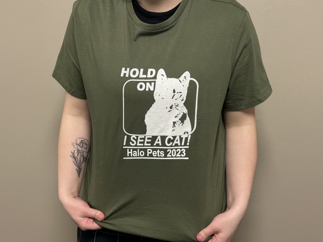 model wearing the green halo pets t-shirt
