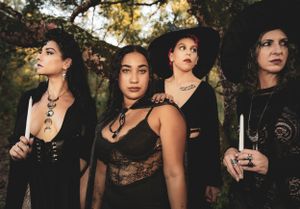Gothic fashion portrait series featuring dark clothing and dramatic styling in natural setting.