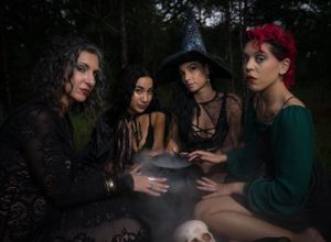 A mysterious gathering in the dark with smoke effects and dim lighting.