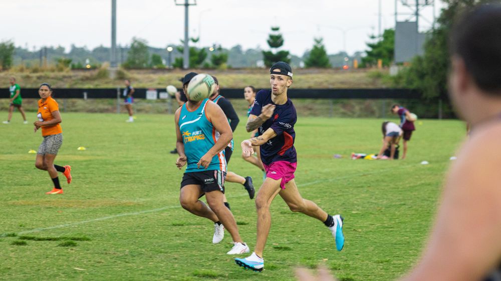 Athletes participating in rugby practice drills and exercises.
