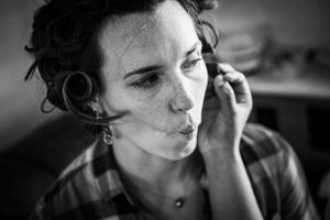 Applying makeup for the wedding day.