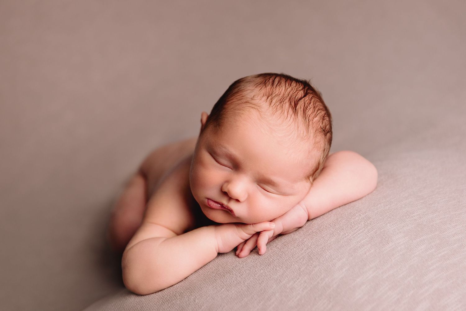 baby boy sleeping on grey blanket by raytown missouri based kc metro photographer