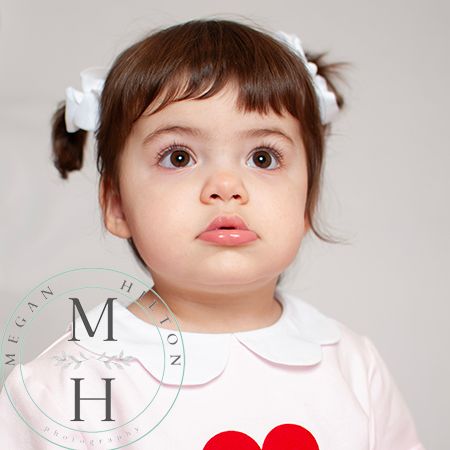 Toddler girl picture looking up
