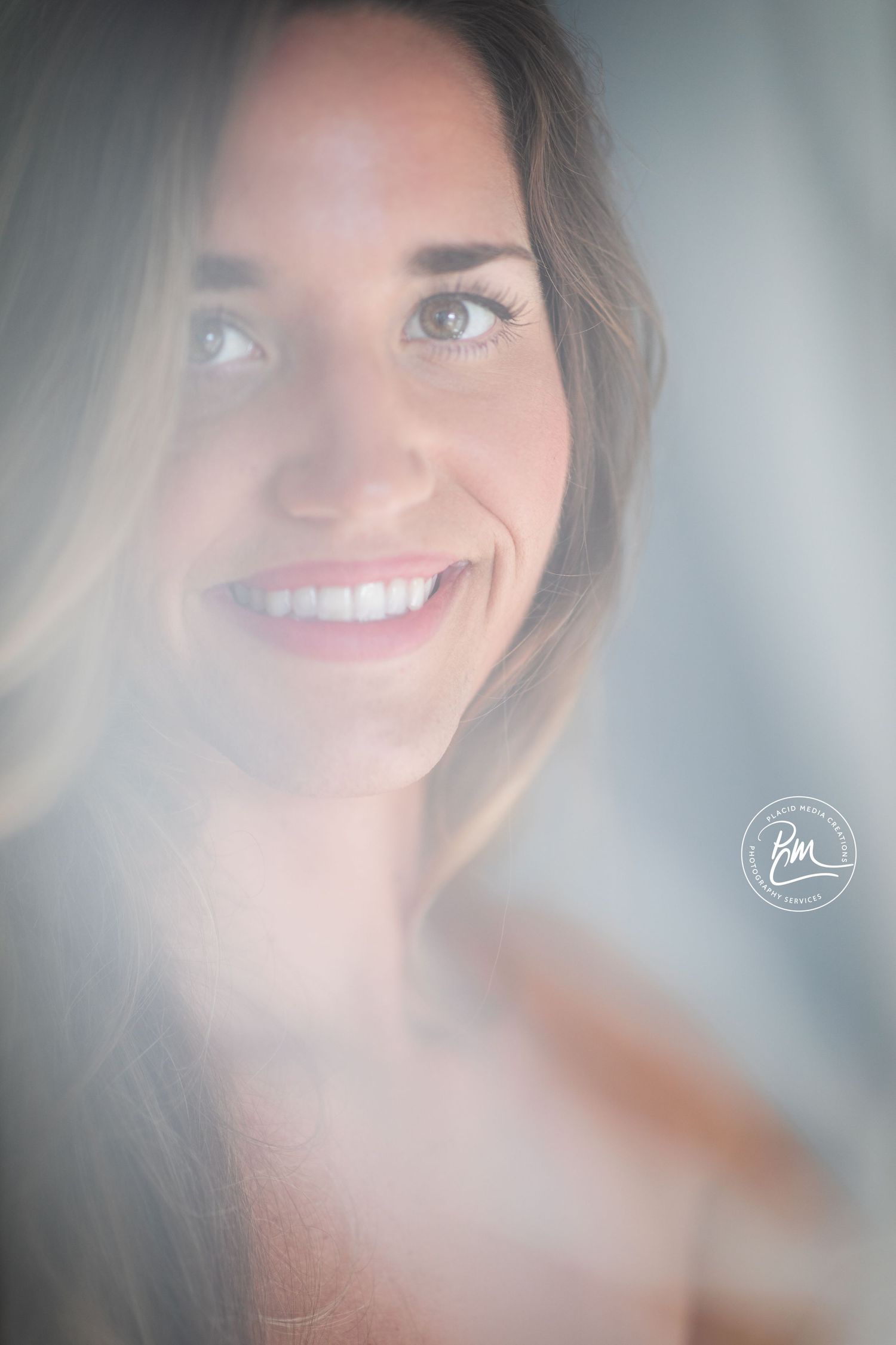 Bride's photograph with a veil is unique captured by Long Island Photographer.