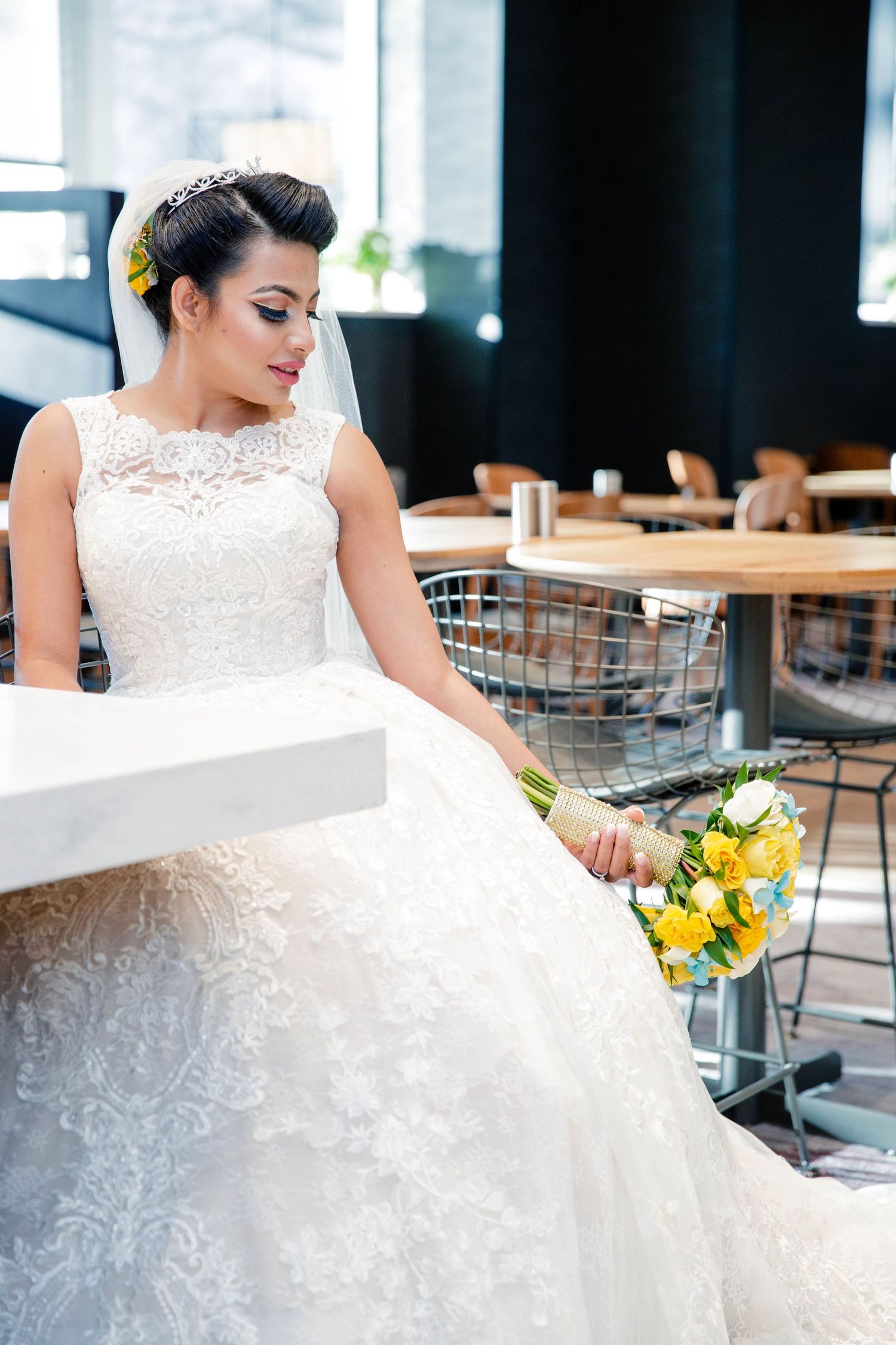 During getting ready for wedding, photographer captures the expressions on Bride's  face. Something to look back on,