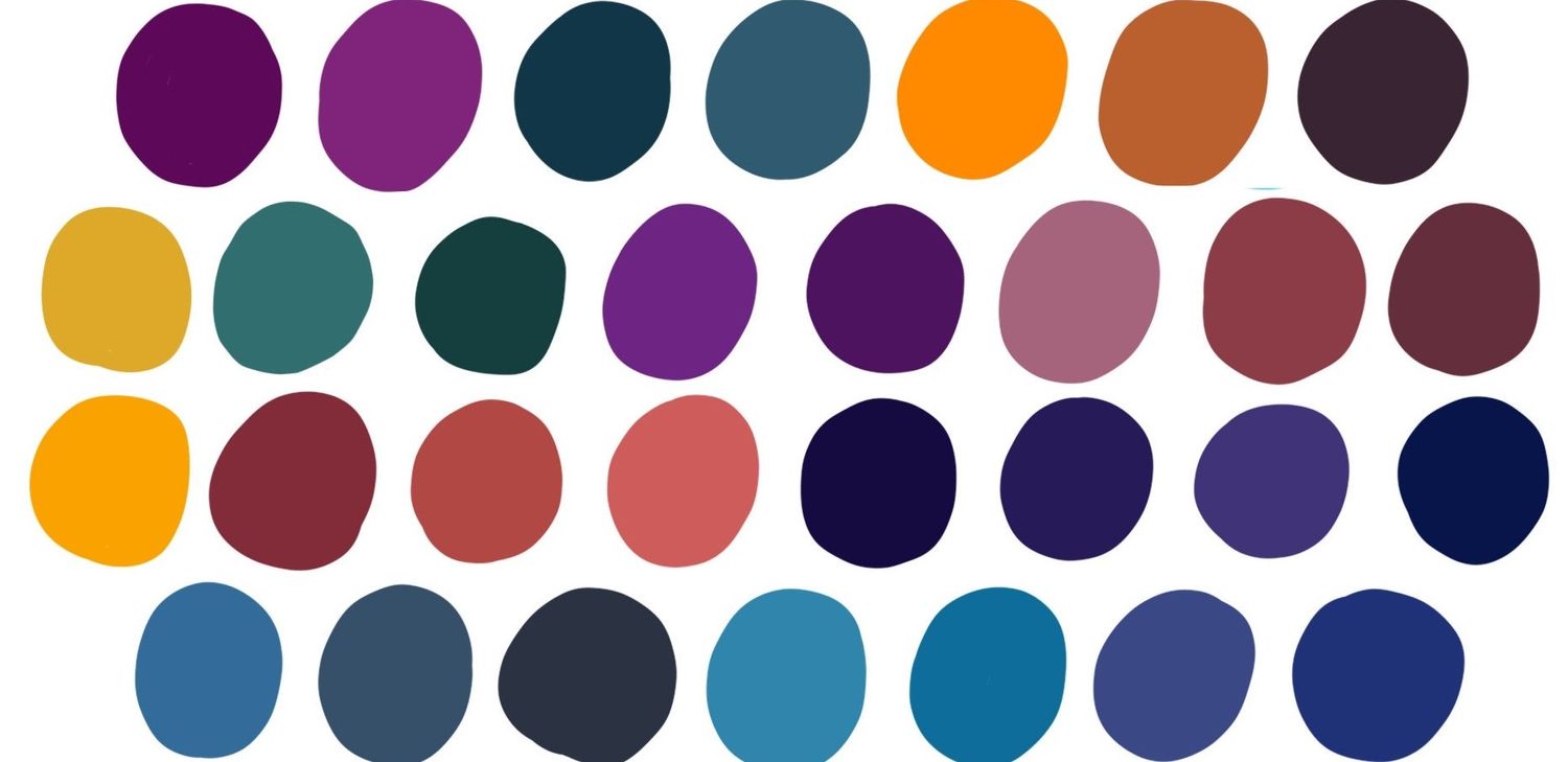 Collection of colored circular dots arranged in rows showing various shades of purple, orange, red and blue.
