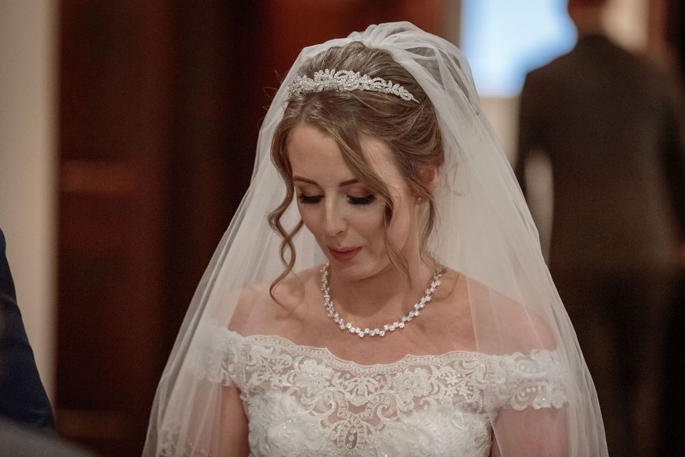 head and shoulders shot of the beautiful bride during the ceremony