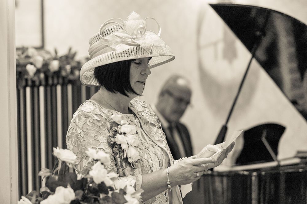 wedding guest gives a reading at the haydock mercure