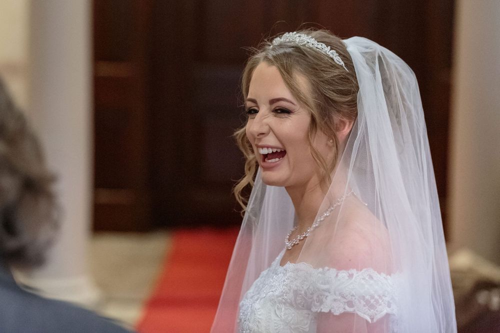 bride laughing at the registrars mistake