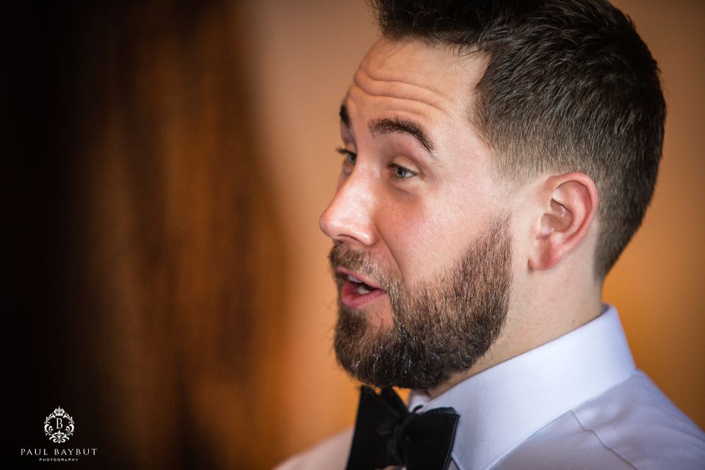 Side profile shot in formal evening wear.