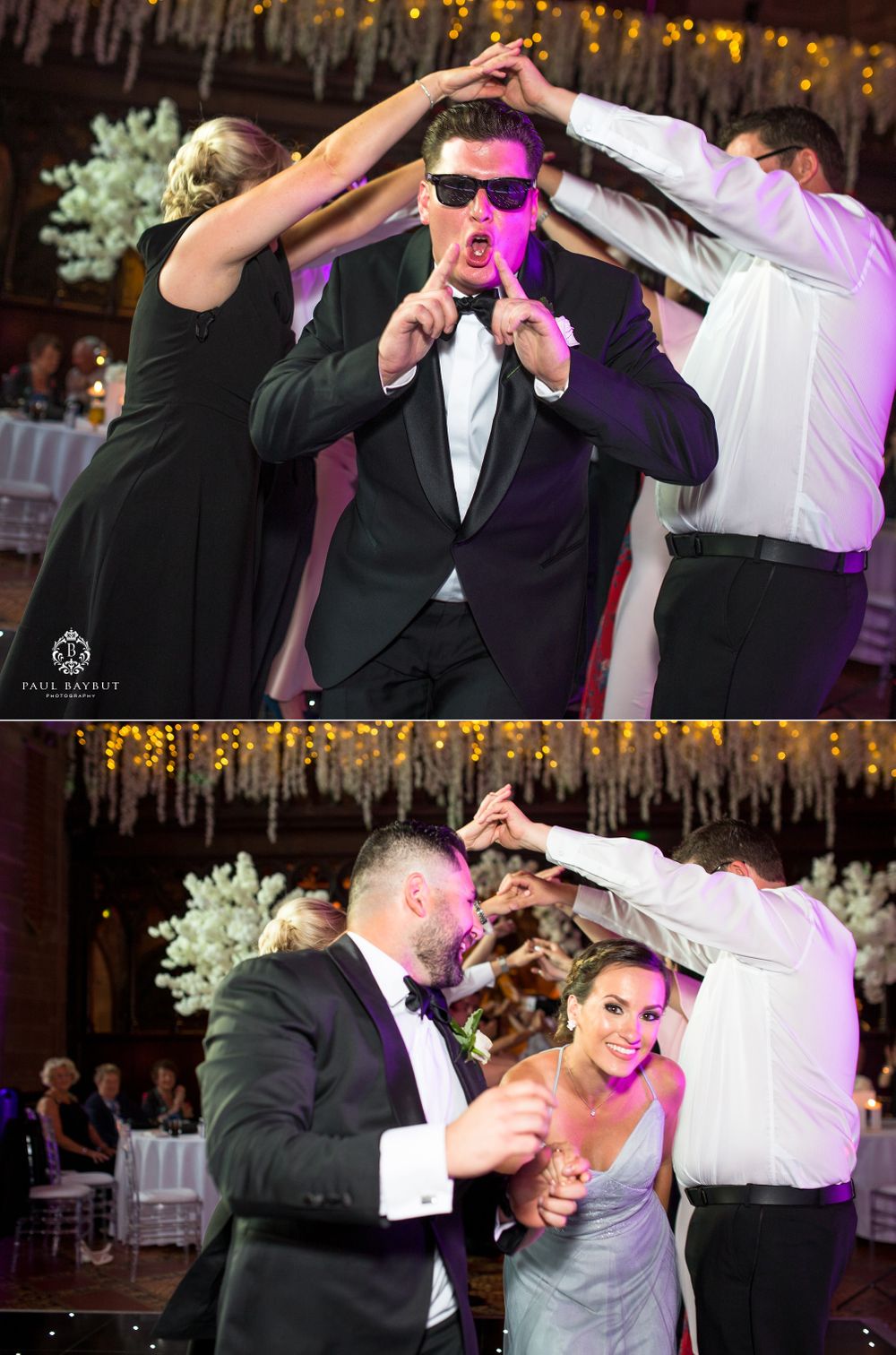Energetic wedding dance party scene with guests in black tie attire under decorative string lights.