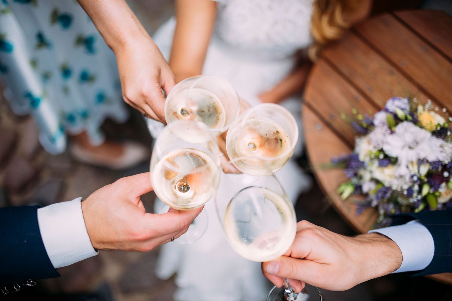 Toasting with glasses of champaigne