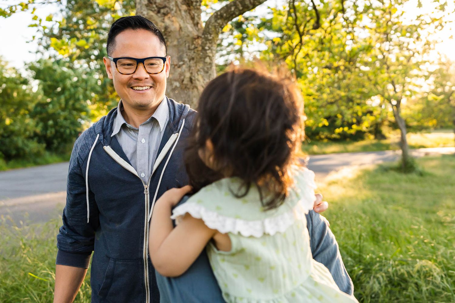 Seattle family photographer capturing father smiling at daughter