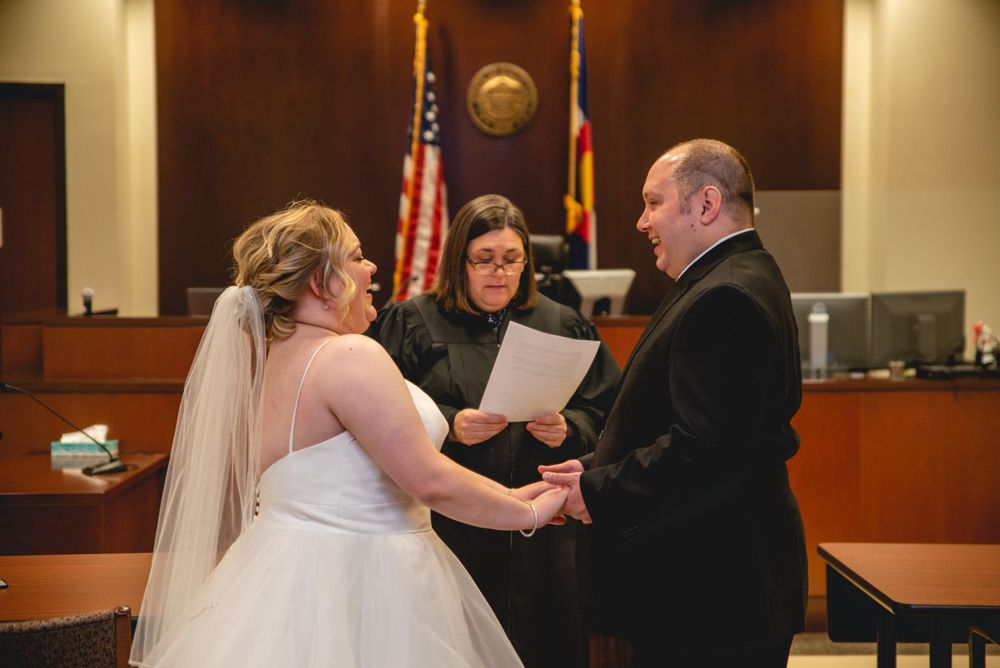 bride and groom laughing during ceremony