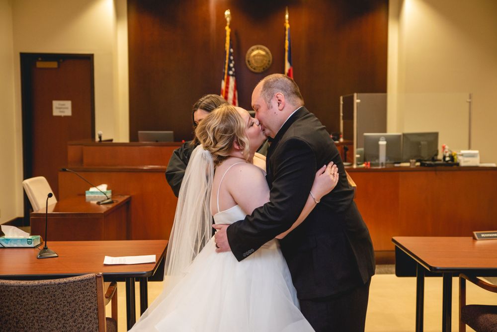 bride and groom kissing for the first time