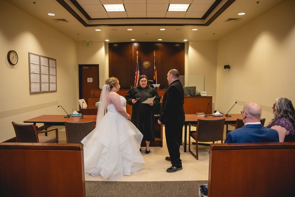 bride and groom getting married by judge