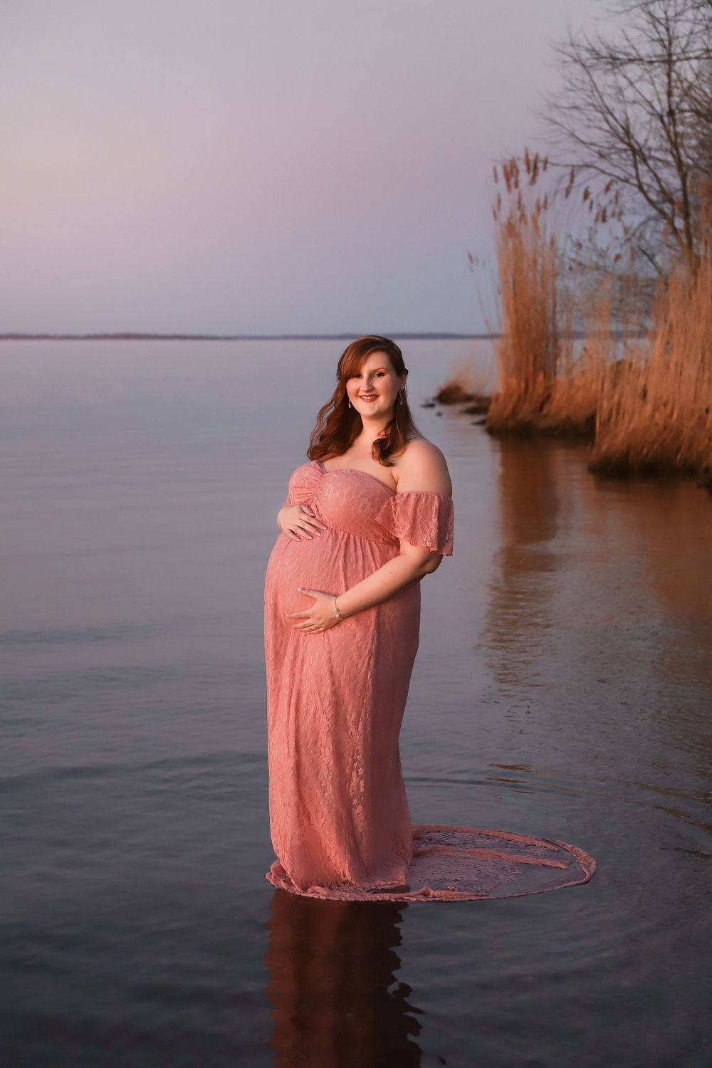 Fine art outdoor maternity portrait in Winter/Spring at the beach with flowy dress