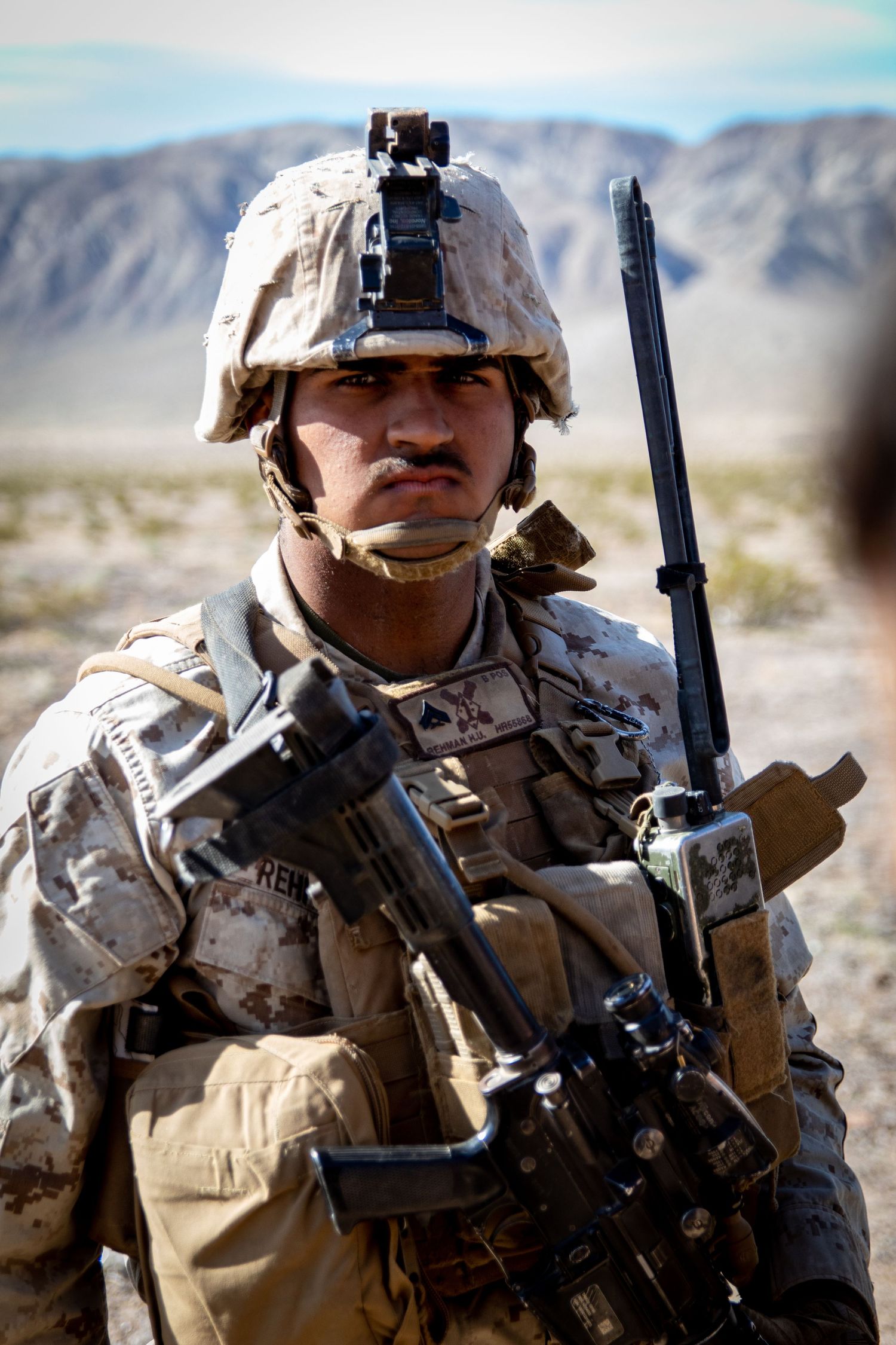 marine looking disgruntled in the field