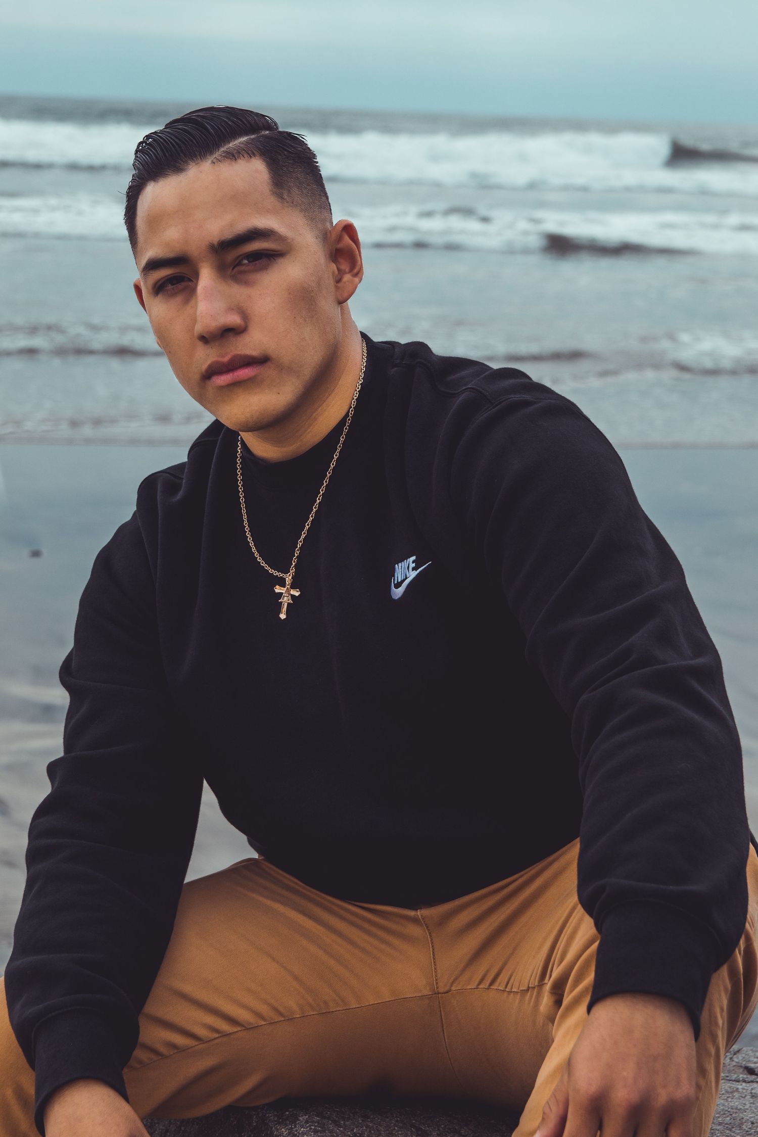 man posing on beach in oceanside,ca