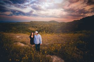 Couple holding hands hiking through Mark Twain National Forest, Ava MO, captured by Morgan Lea Photography