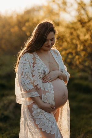 Sunset family photographer. Maternity photoshoot at 32 weeks pregnant - Lifestyle family photography from a family photoshoot in shrewsbury