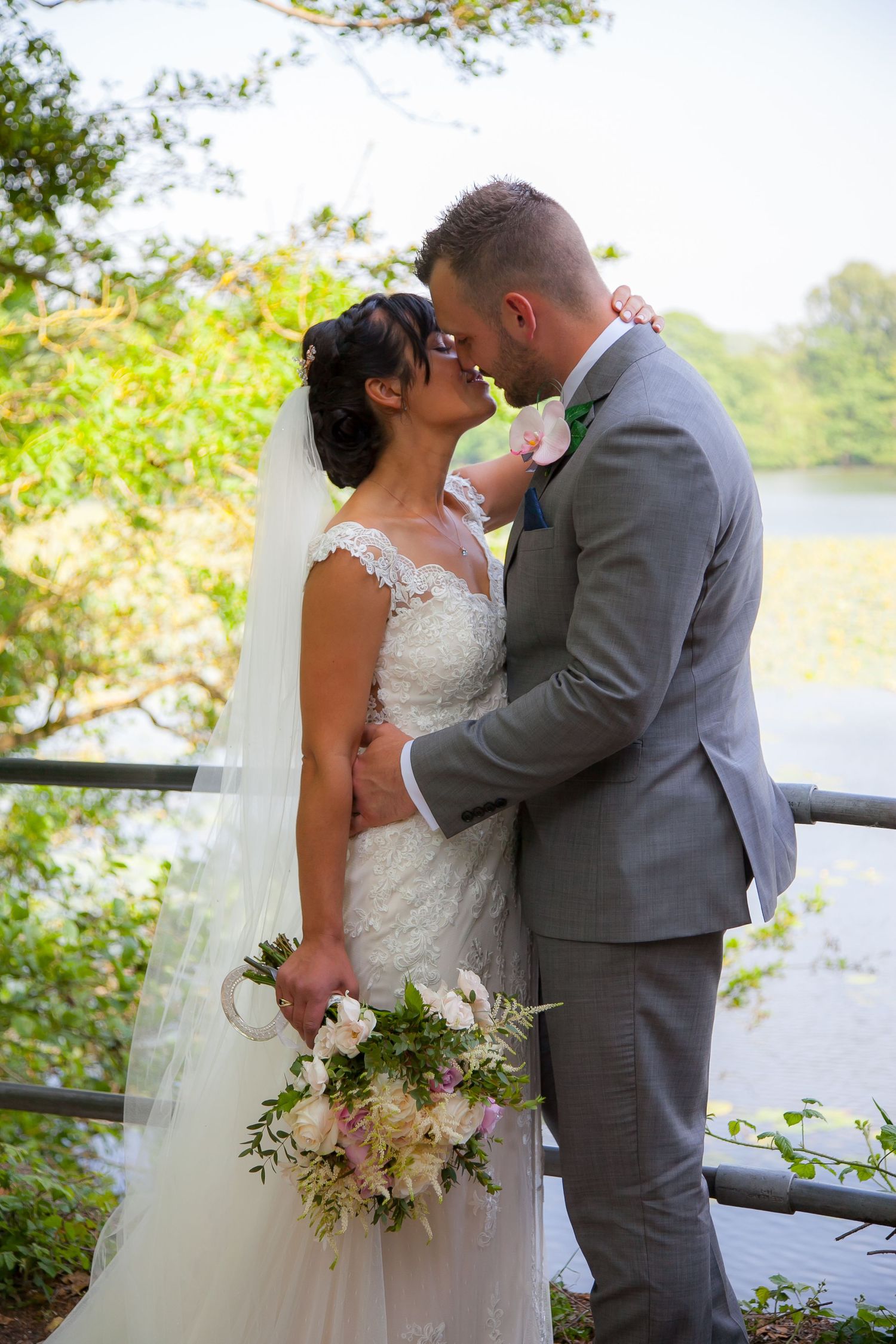 Bride & groom Ashford Eastwell manor Couple Kent Wedding photographer