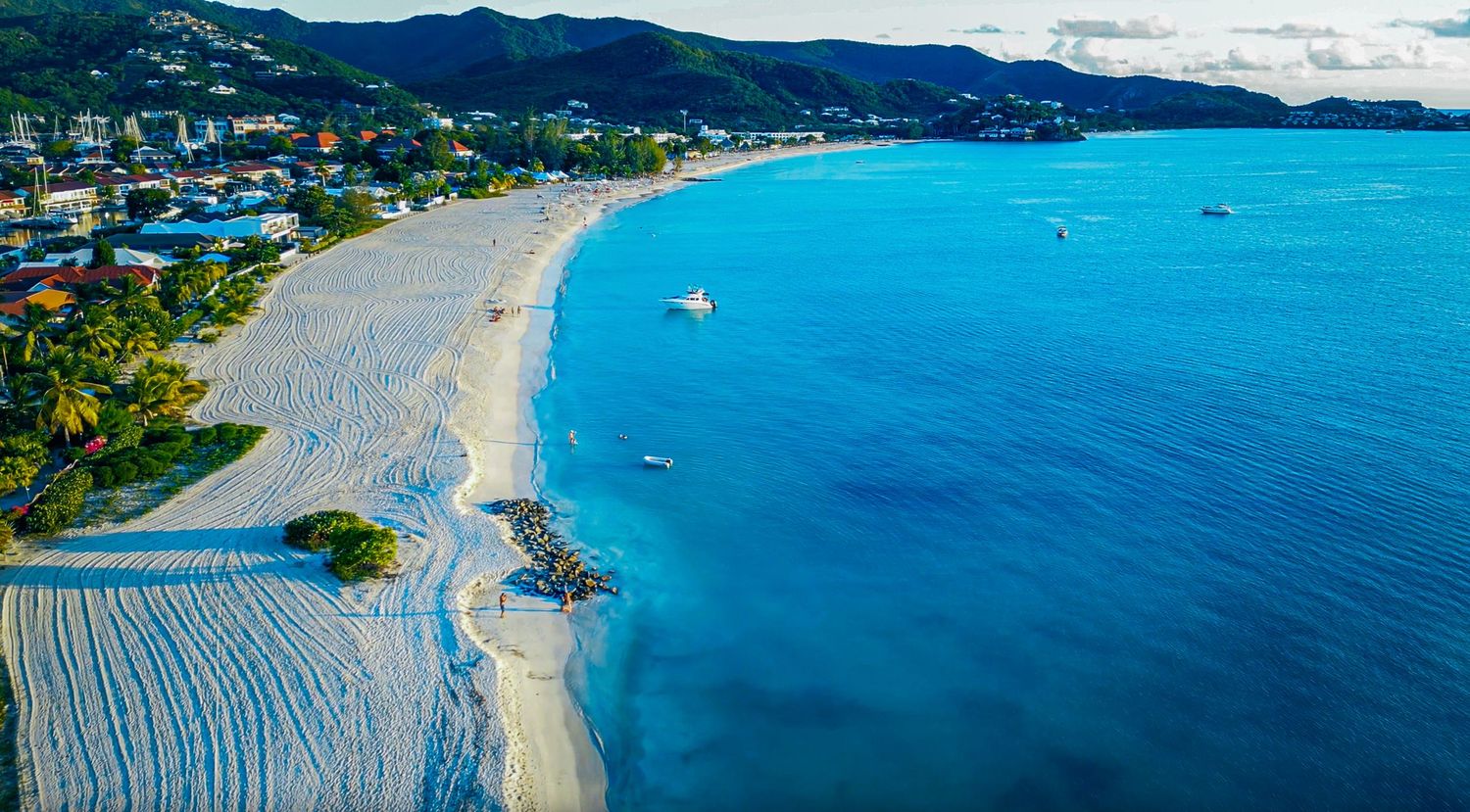 Aerial view of turquoise Caribbean shoreline — travel photography by Timoy B Photography in Antigua.