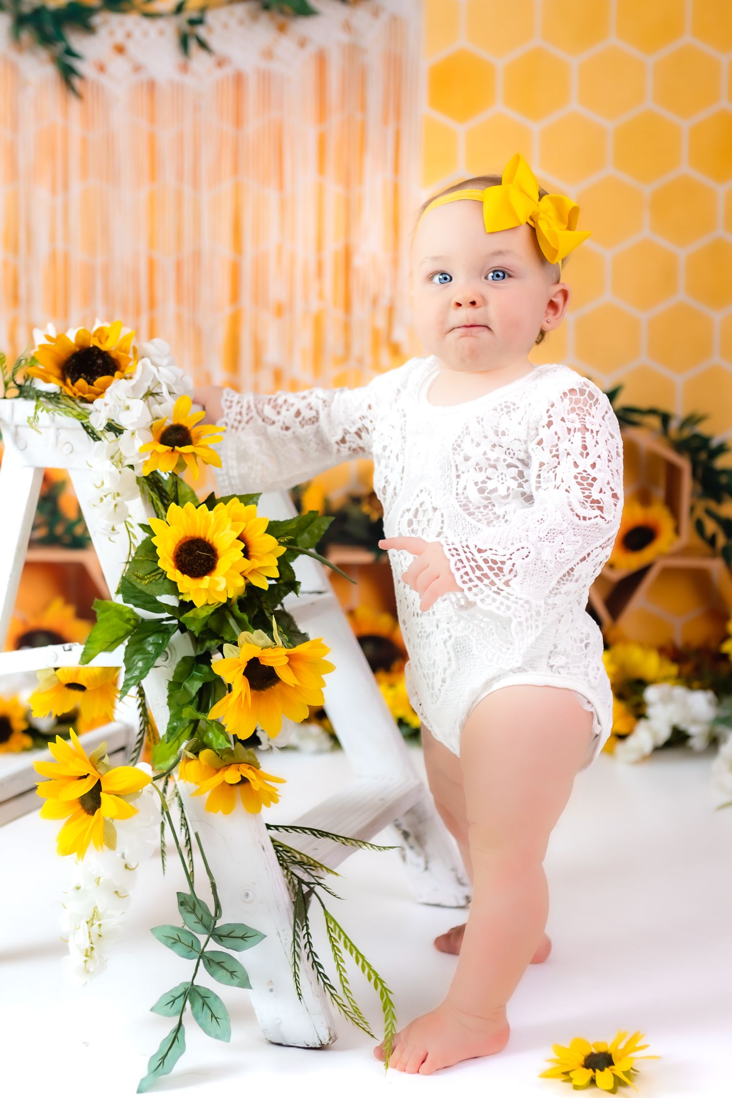 Family photographer 1st birthday milestone photo yellow sunflower