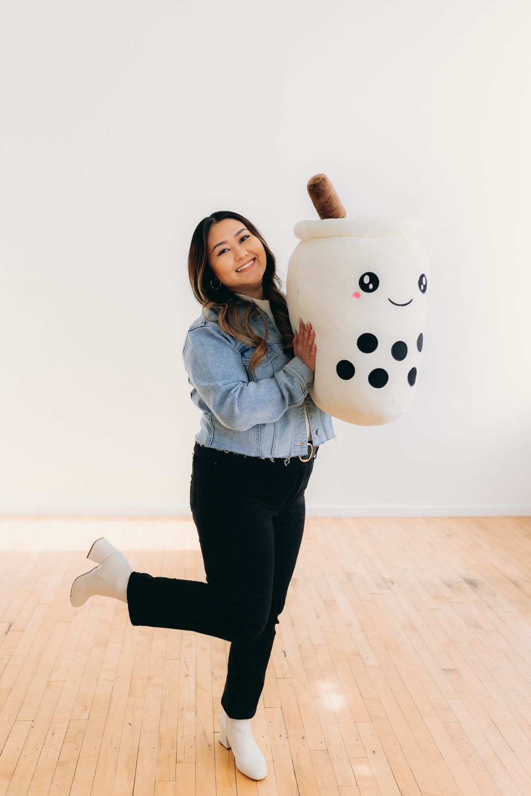 Minnesota photographer holding a stuffed bubble tea