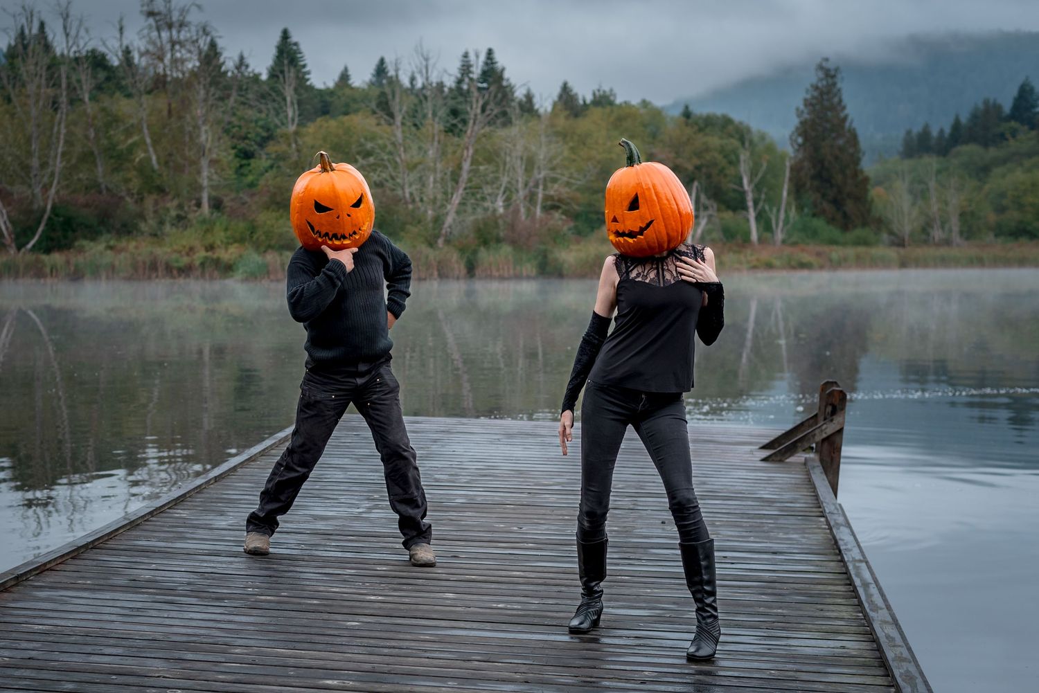 headless horseman and headless horsewoman on a dock on Salt Spring Island, BC