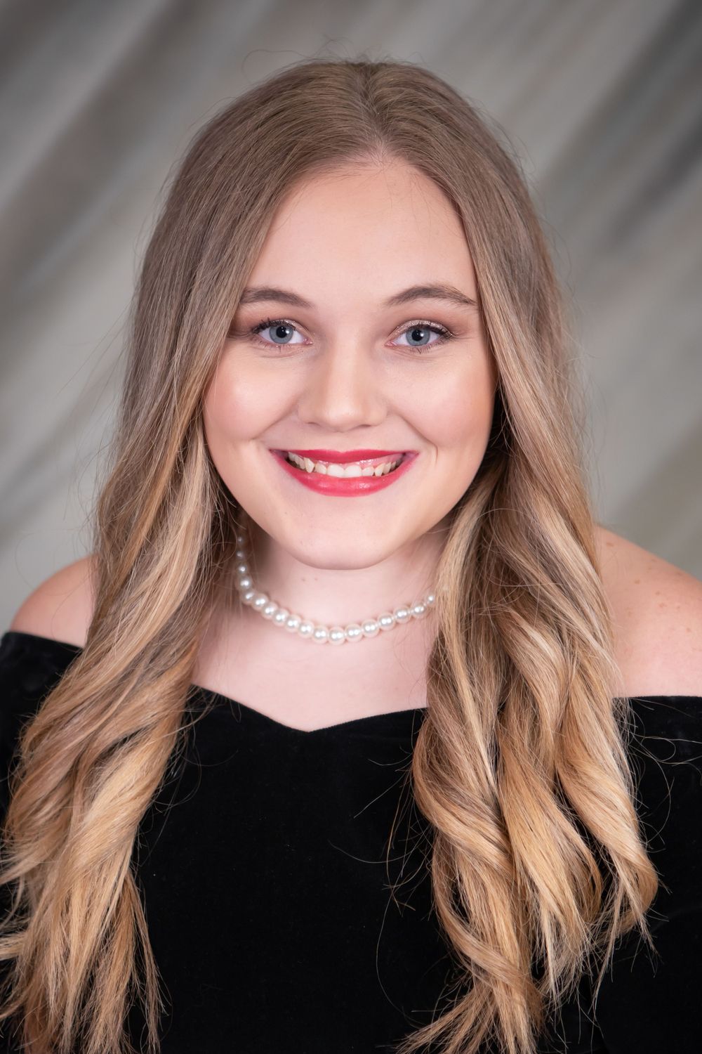 senior girl in black drape
