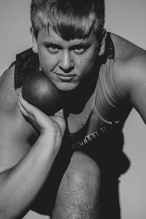 Dramatic black and white portrait series showing intense expressions and shadows.