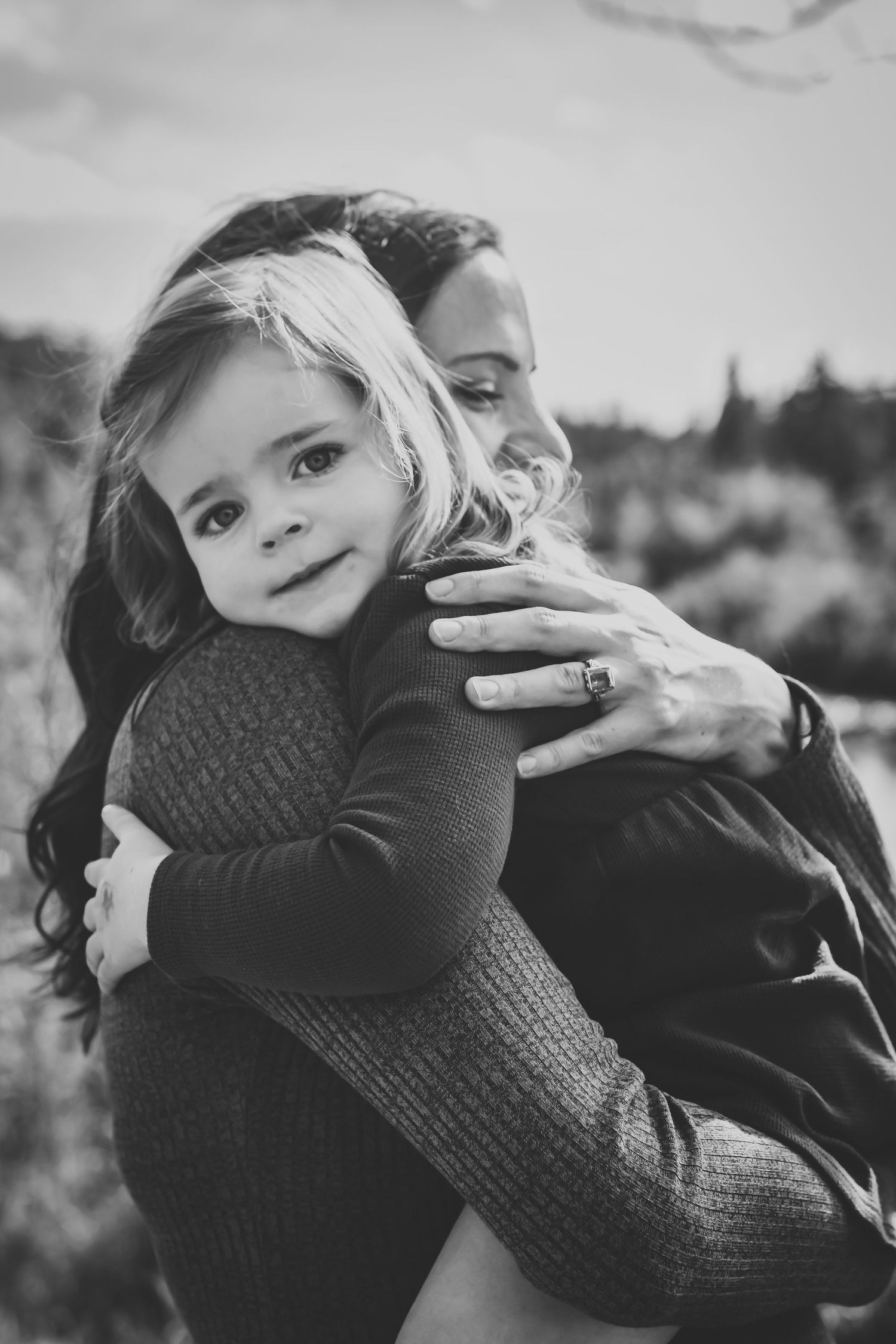 Beautiful motherhood moment: Lifestyle family photography in Calgary Alberta by Love & Sunshine Photography.