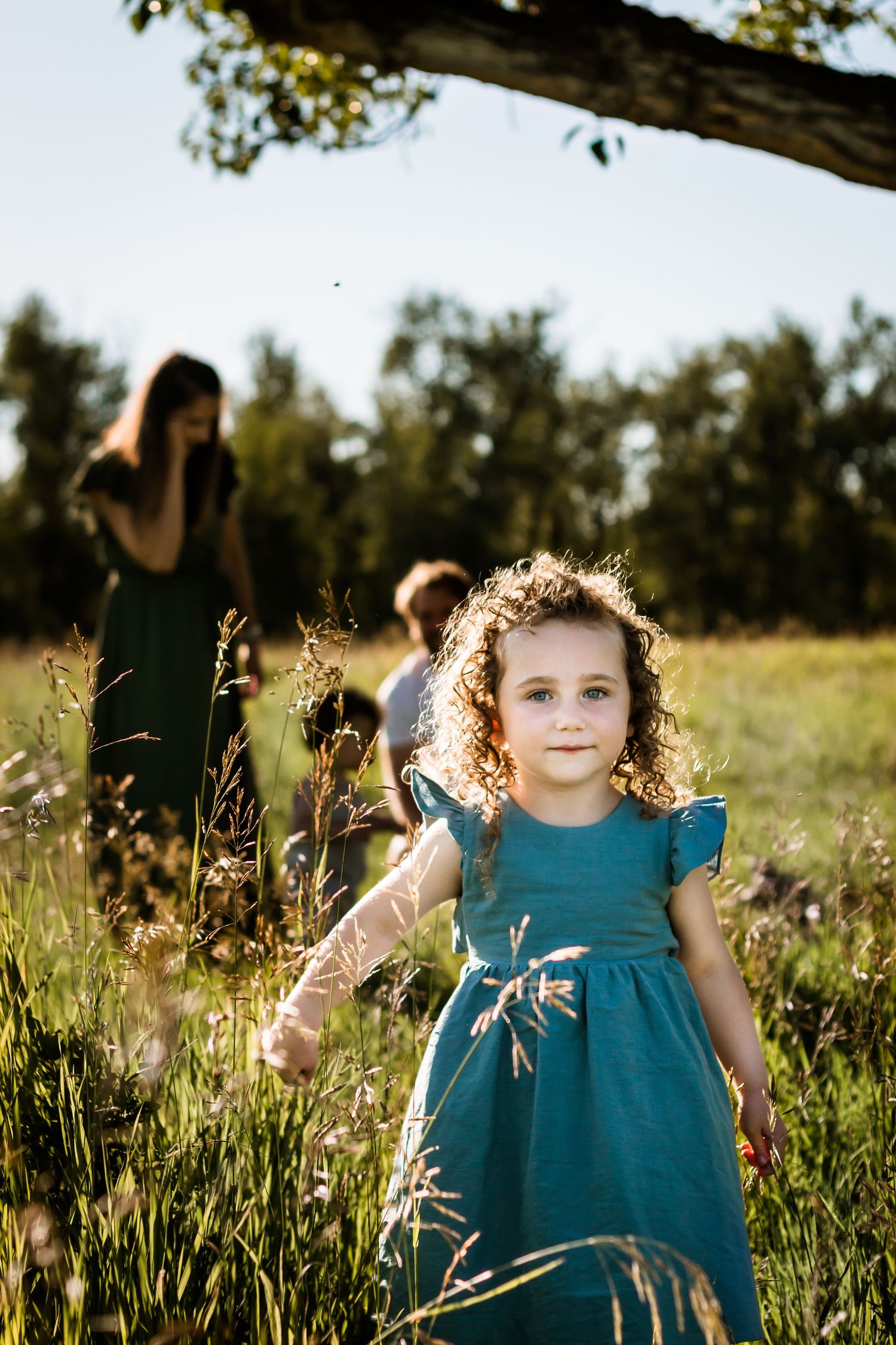 Beautiful portrait during outdoor lifestyle family photo session in Calgary AB by Love & Sunshine Photography.