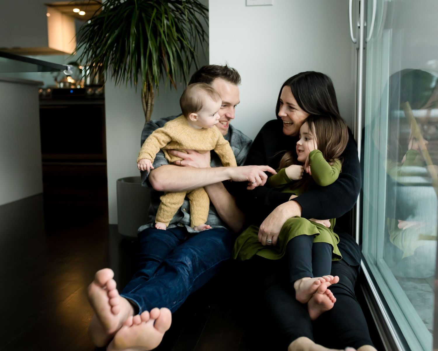 Beautiful authentic in-home lifestyle family photos in Calgary Alberta by Love & Sunshine Photography.