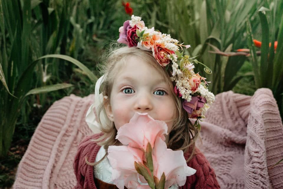 Child photography flower field