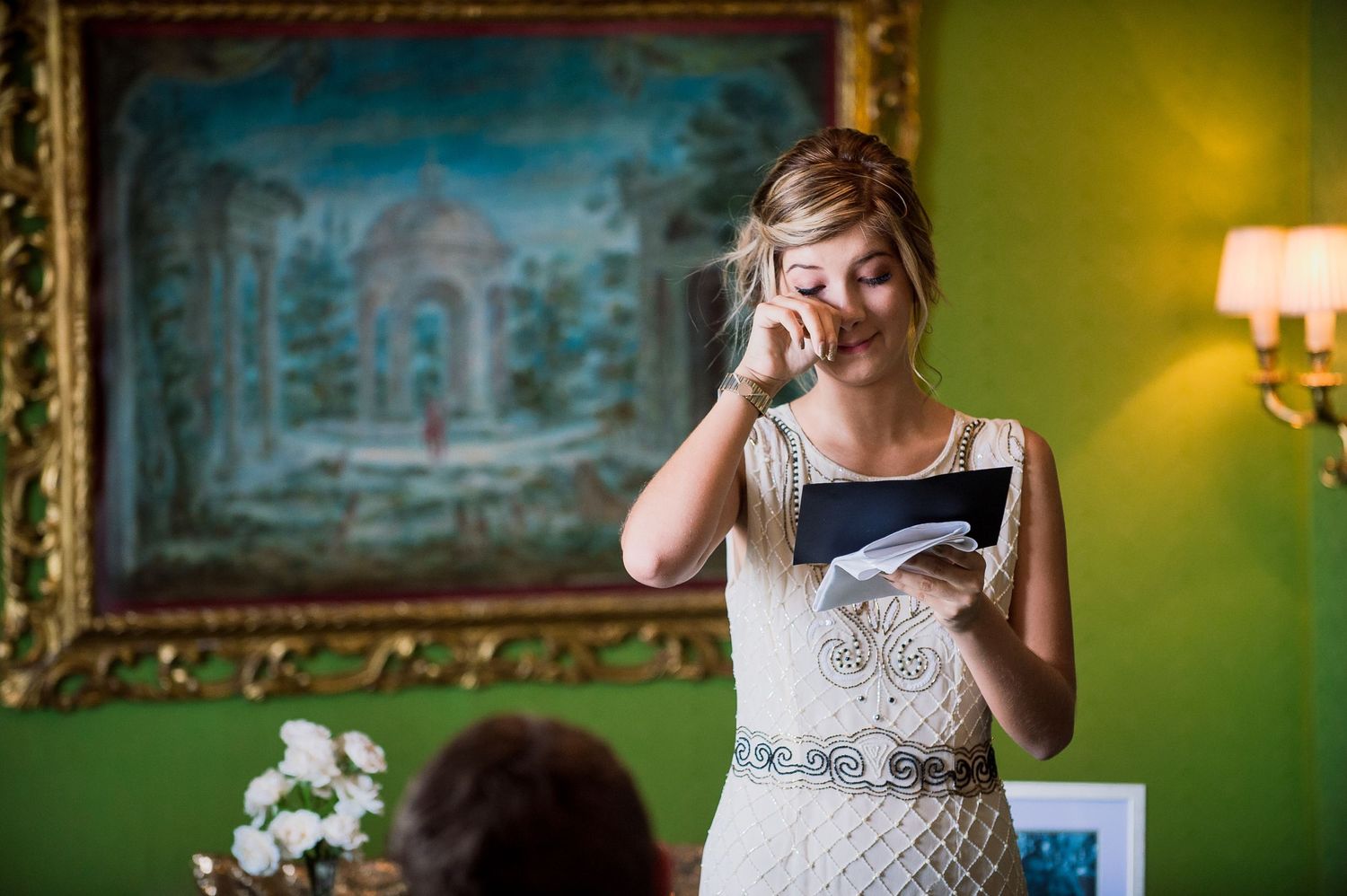 Tearful bride making speech in The Dorchester's baroque green room