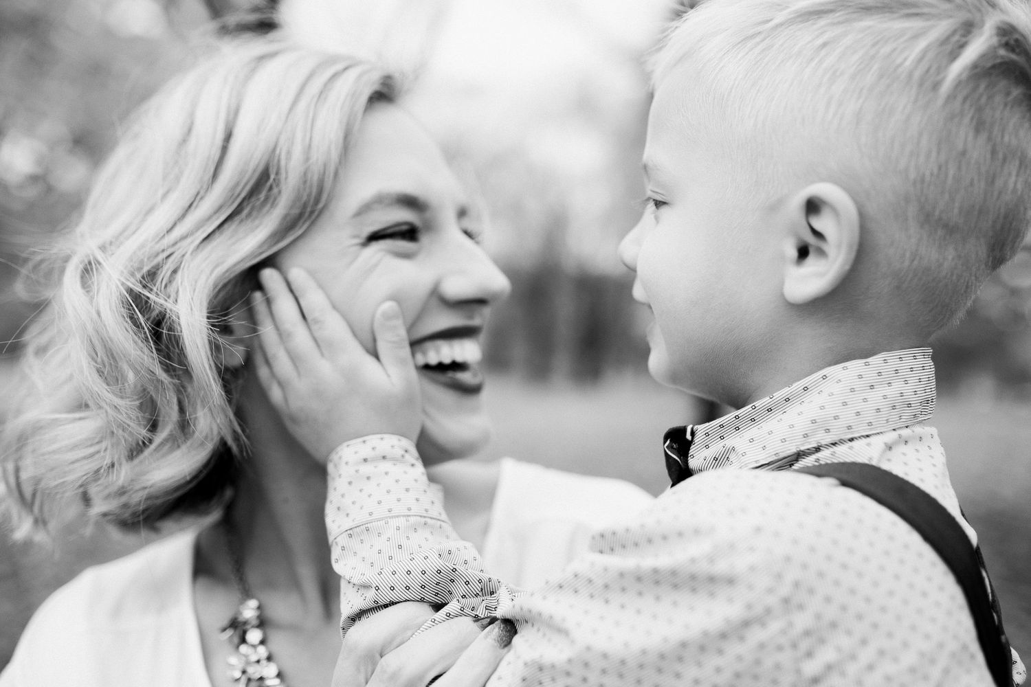 mom and son photo, natural emotional photography, light airy photos, family photos in memorial park, omaha, loveland