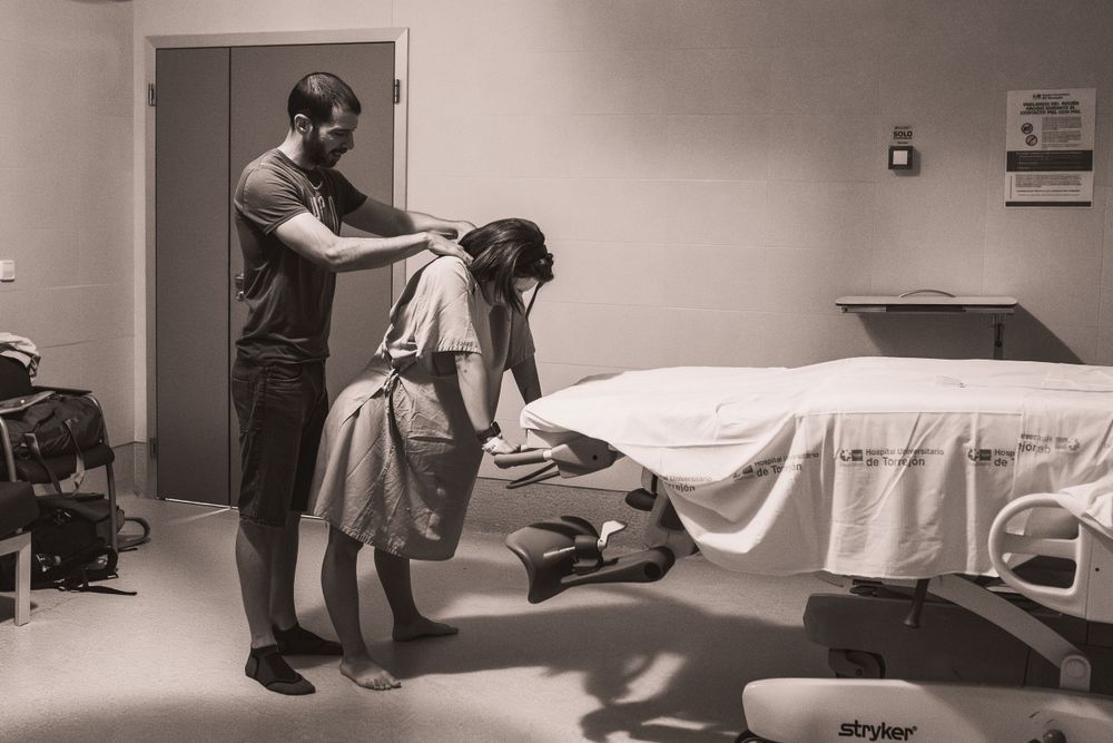 A sequence showing movement across a medical room with examination equipment and furniture.