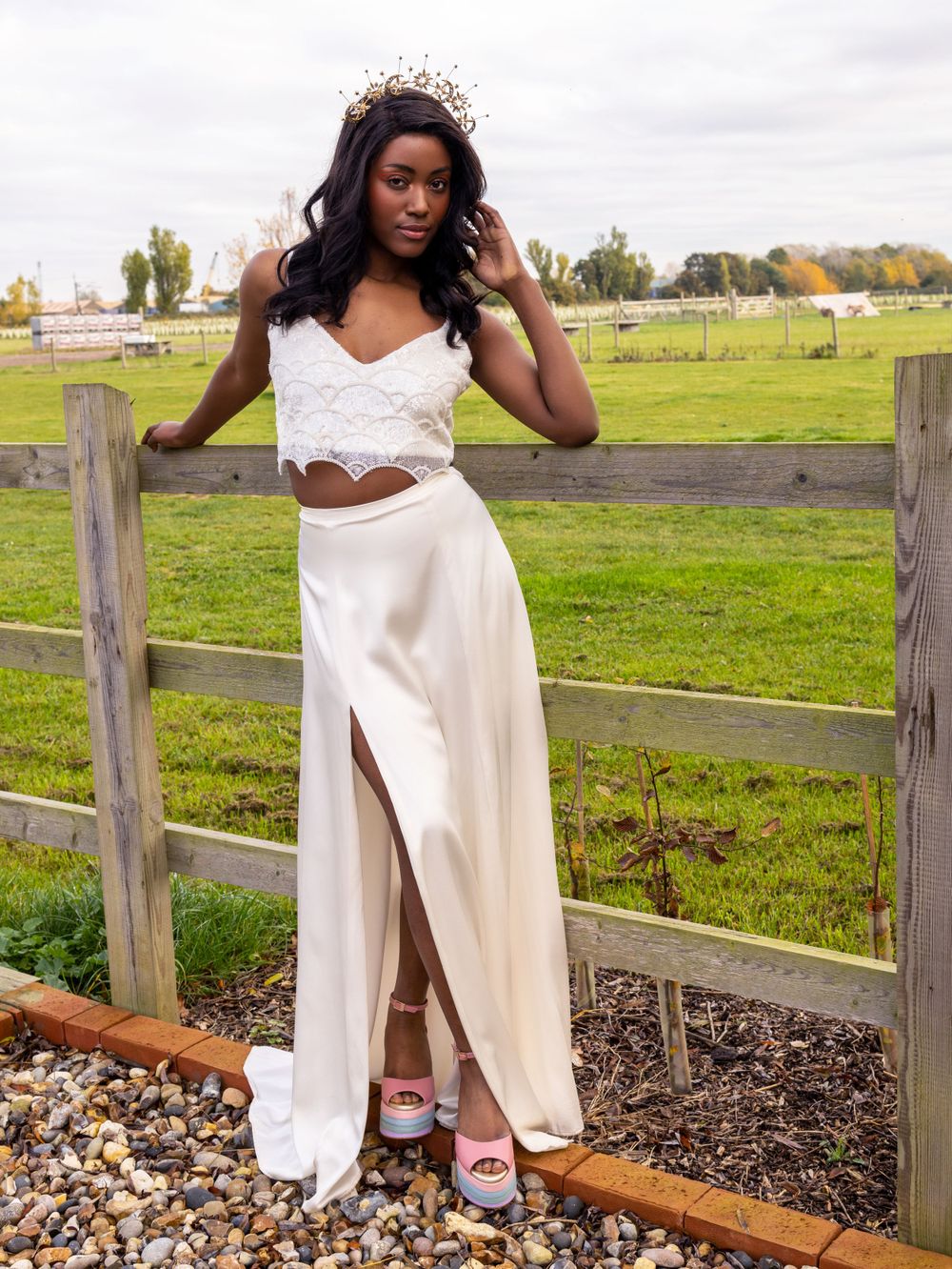 Faz a beautiful black model is wearing a white two piece by Lucy Can't Dance at the canary  Shed in Essex